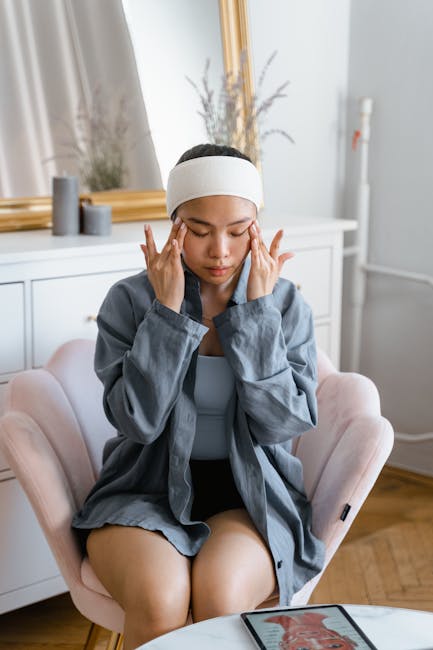 relaxed woman with closed eyes enjoying peaceful moment after eye massage in comfortable wellness setting with natural lighting